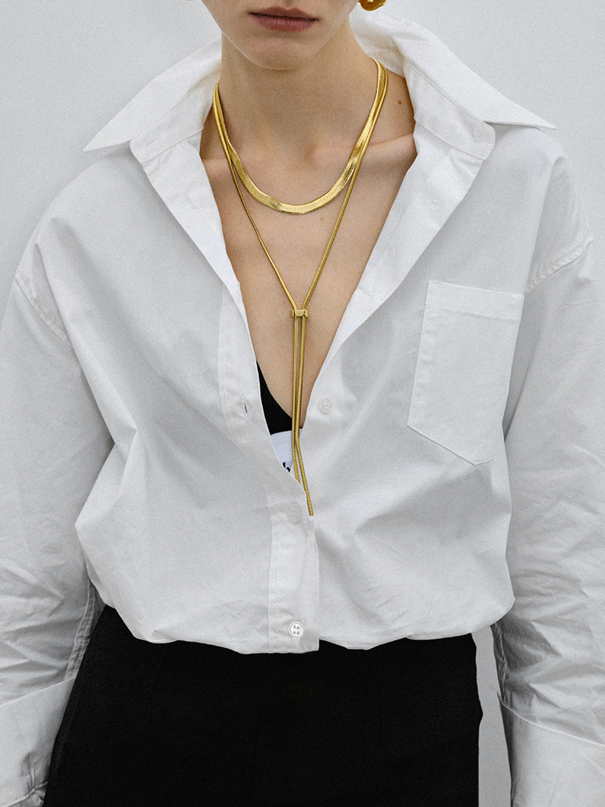 Y Harfi Püsküllü Kolye Altın Rengi Titanyum Çelik